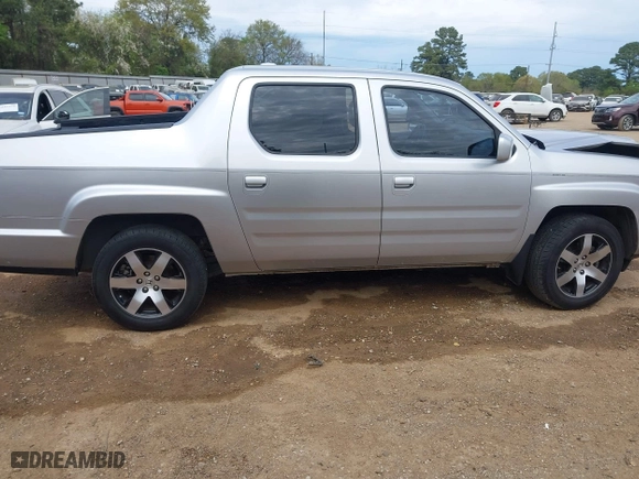 2014 Honda Ridgeline SE with VIN 5FPYK1F62EB013329, listed as a IAAI auction lot 41876728 with 127,014 mi miles. Bid and sale history available at carsss.com. Image 13.