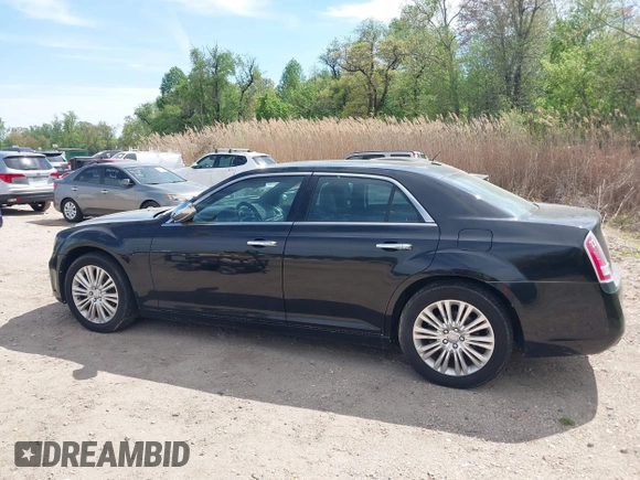 2013 Chrysler 300 with VIN 2C3CCAKG2DH645193, listed as a IAAI auction lot 42105459 with 230,063 mi miles. Bid and sale history available at carsss.com. Image 14.
