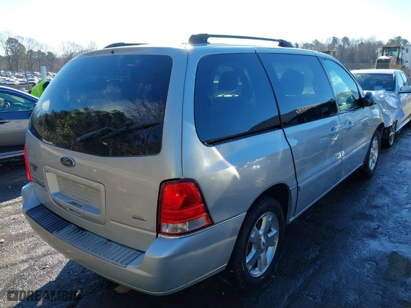 2007 Ford Freestar Wagon SEL with VIN 2FMDA52297BA31987, listed as a IAAI auction lot 41385567 with 133,154 mi miles. Bid and sale history available at carsss.com. Image 4.