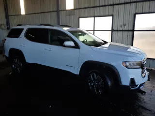 2023 GMC Acadia SLT with VIN 1GKKNUL4XPZ150997, listed as a Copart auction lot 88820265 with 51,516 mi miles and Clean Title. Bid and sale history available at DreamBid. Image 4.