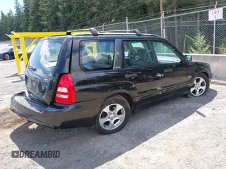 2003 Subaru Forester XS with VIN JF1SG65693H732708, listed as a IAAI auction lot 42739200 with 159,794 mi miles and . Bid and sale history available at DreamBid. Image 4.