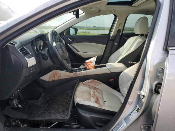 2016 Mazda 6 i Grand Touring с VIN JM1GJ1W53G1434499, выставлен на аукционе Copart как лот 54739745 с пробегом Не указан миль и Списание • Salvage title. История ставок и продаж доступна на DreamBid. Изображение 7.