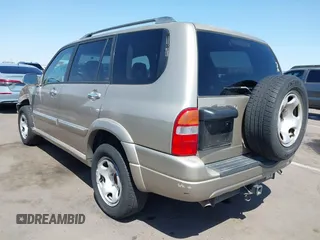 2003 Suzuki XL7 Touring with VIN JS3TX92V534103046, listed as a IAAI auction lot 41978971 with 185,038 mi miles and . Bid and sale history available at DreamBid. Image 3.