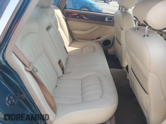 1996 Jaguar XJ z VIN SAJHX1746TC756451, wystawiony jako Copart lot #48991655 z przebiegiem 115 015 mil mil oraz Szkoda całkowita • Salvage title. Historia ofert i sprzedaży dostępna na DreamBid. Obrazek 10.