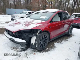 2023 Tesla Model X with VIN 7SAXCBE51PF404297, listed as a IAAI auction lot 41314595 with 25,020 mi miles and . Bid and sale history available at DreamBid. Image 19.