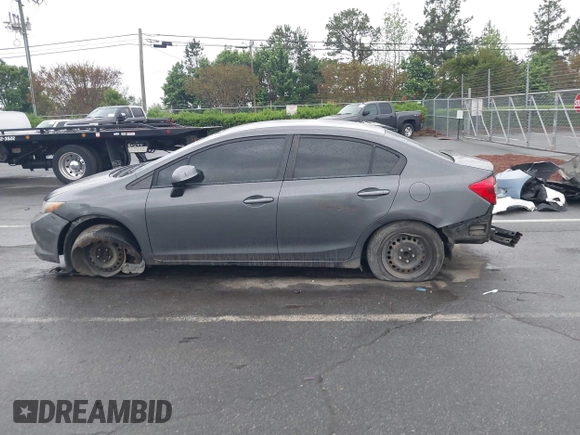 2012 Honda Civic LX with VIN 2HGFB2F58CH593658, listed as a IAAI auction lot 41965400 with 172,340 mi miles and . Bid and sale history available at DreamBid. Image 14.