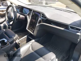 2015 Tesla Model S 85D with VIN 5YJSA1H2XFF084145, listed as a IAAI auction lot 42101755 with 105,660 mi miles. Bid and sale history available at carsss.com. Image 5.