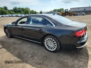 2013 Audi A8 4.0L with VIN WAUR2AFD2DN028826, listed as a Copart auction lot 64756025 with 107,761 mi miles and Salvage title. Bid and sale history available at DreamBid. Image 2.