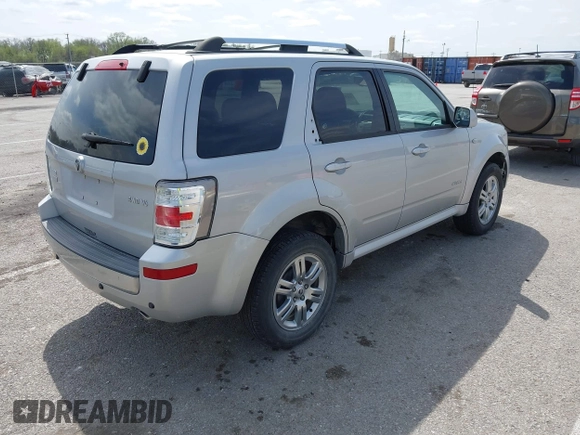 2008 Mercury Mariner Premier with VIN 4M2CU97198KJ12620, listed as a IAAI auction lot 41909389 with 131,884 mi miles and . Bid and sale history available at DreamBid. Image 4.
