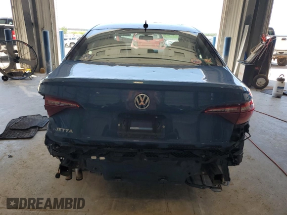 2019 Volkswagen Jetta S z VIN 3VWC57BU4KM209973, wystawiony jako Copart lot #62281525 z przebiegiem 46 927 mil mil oraz Czysty tytuł • Clean title. Historia ofert i sprzedaży dostępna na DreamBid. Obrazek 6.