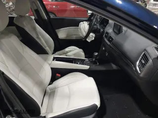 2018 Mazda Mazda3 4-Door Grand Touring with VIN 3MZBN1W34JM181651, listed as a IAAI auction lot 41908888 with 54,073 mi miles. Bid and sale history available at carsss.com. Image 5.