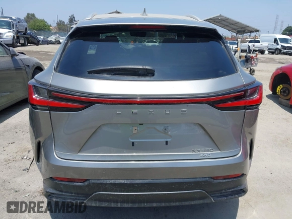 2022 Lexus NX 350 Premium z VIN 2T2GGCEZ1NC008202, wystawiony jako IAAI lot #42438898 z przebiegiem 14 729 mil mil oraz . Historia ofert i sprzedaży dostępna na DreamBid. Obrazek 16.