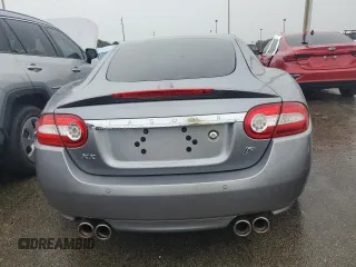 2010 Jaguar XK with VIN SAJWA4DC7AMB34148, listed as a Copart auction lot 74837624 with 0 mi miles and Salvage Title. Bid and sale history available at carsss.com. Image 6.