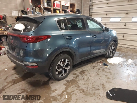 2021 Kia Sportage LX with VIN KNDPMCACXM7861454, listed as a IAAI auction lot 41596043 with 24,205 mi miles and . Bid and sale history available at carsss.com. Image 4.
