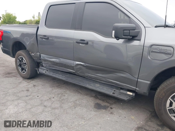 2023 Ford F-150 Lightning Pro with VIN 1FTVW1EL8PWG48559, listed as a IAAI auction lot 42033123 with 8,845 mi miles and . Bid and sale history available at DreamBid. Image 6.