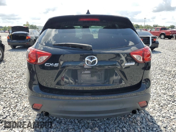 2014 Mazda CX-5 Touring z VIN JM3KE2CY8E0326988, wystawiony jako Copart lot #60473715 z przebiegiem 231 055 mil mil oraz Czysty tytuł • Clean title. Historia ofert i sprzedaży dostępna na DreamBid. Obrazek 6.