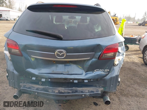 2014 Mazda CX-9 Grand Touring with VIN JM3TB3DV2E0435230, listed as a IAAI auction lot 41041440 with 145,538 mi miles and . Bid and sale history available at DreamBid. Image 6.