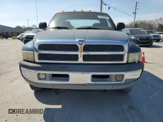 1999 Dodge 2500 with VIN 1B7KC23Z0XJ594695, listed as a Copart auction lot 50990825 with 235,365 mi miles and Clean title. Bid and sale history available at DreamBid. Image 5.
