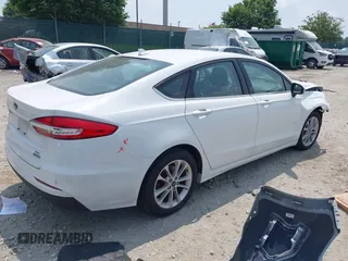2020 Ford Fusion SE with VIN 3FA6P0LUXLR155881, listed as a IAAI auction lot 42426199 with 103,809 mi miles and . Bid and sale history available at DreamBid. Image 4.