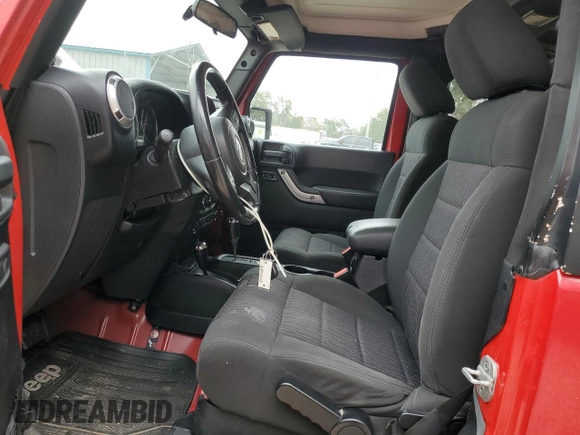 2012 Jeep Wrangler Arctic z VIN 1C4AJWBG9CL123832, wystawiony jako Copart lot #87376204 z przebiegiem 174 097 mil mil oraz Szkoda całkowita • Salvage title. Historia ofert i sprzedaży dostępna na DreamBid. Obrazek 7.