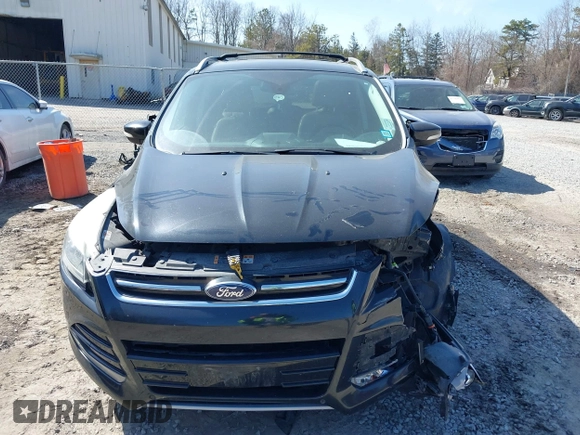 2014 Ford Escape Titanium with VIN 1FMCU9JX2EUA96338, listed as a IAAI auction lot 41806850 with 127,745 mi miles. Bid and sale history available at carsss.com. Image 6.