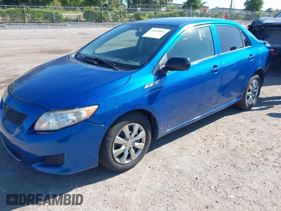 2009 Toyota Corolla with VIN JTDBL40E999021523, listed as a IAAI auction lot 42019856 with 194,011 mi miles. Bid and sale history available at carsss.com. Image 18.