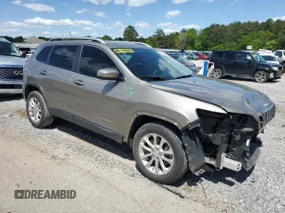 2019 Jeep Cherokee Latitude with VIN 1C4PJLCB5KD344705, listed as a Copart auction lot 52260515 with 110,894 mi miles and Salvage Title. Bid and sale history available at carsss.com. Image 4.