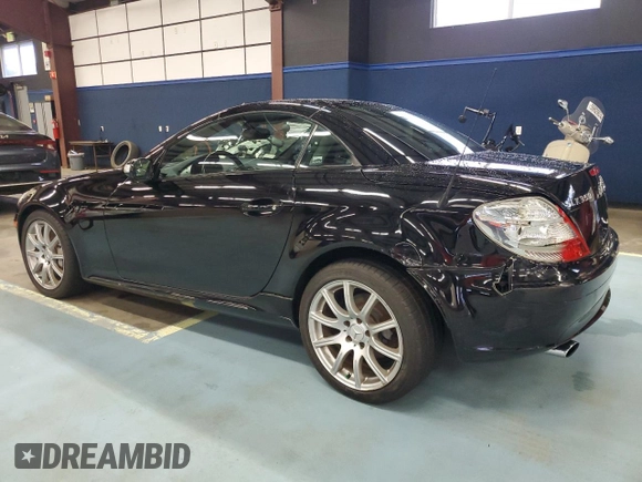 2005 Mercedes-Benz SLK-Class with VIN WDBWK56FX5F049285, listed as a Copart auction lot 73306494 with 94,785 mi miles and Salvage Title. Bid and sale history available at carsss.com. Image 2.