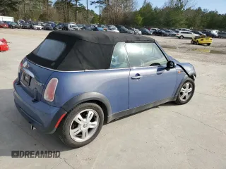 2005 MINI Convertible with VIN WMWRF33555TF62593, listed as a Copart auction lot 48305985 with 172,839 mi miles and Salvage title. Bid and sale history available at DreamBid. Image 3.