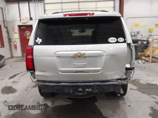 2015 Chevrolet Tahoe LT z VIN 1GNSKBKC7FR255956, wystawiony jako IAAI lot #42310560 z przebiegiem 215 968 mil mil oraz . Historia ofert i sprzedaży dostępna na DreamBid. Obrazek 17.