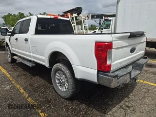 2018 Ford F-350 Platinum with VIN 1FT7W3B60JEB74705, listed as a IAAI auction lot 42679244 with 128,227 mi miles and . Bid and sale history available at DreamBid. Image 3.
