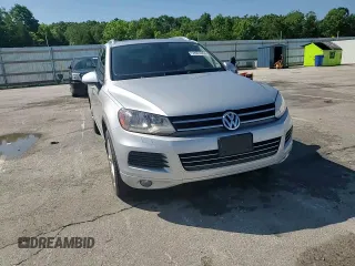 2014 Volkswagen Touareg Lux with VIN WVGEF9BP1ED012267, listed as a Copart auction lot 58924055 with 81,009 mi miles and Salvage title. Bid and sale history available at DreamBid. Image 14.