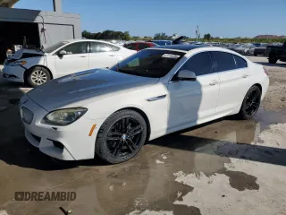 2013 BMW 6 Series 650i with VIN WBA6B2C52DD128713, listed as a Copart auction lot 47415235 with 123,575 mi miles and Clean Title. Bid and sale history available at carsss.com. Image 1.