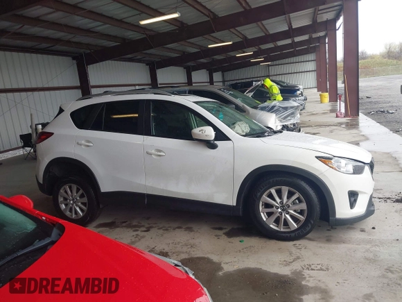 2014 Mazda CX-5 Touring with VIN JM3KE4CY9E0370610, listed as a IAAI auction lot 42016896 with 72,340 mi miles. Bid and sale history available at carsss.com. Image 12.