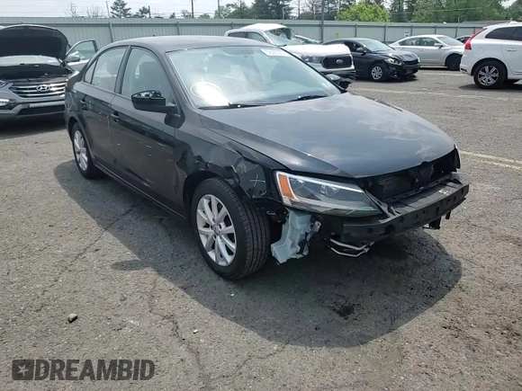 2015 Volkswagen Jetta SE with VIN 3VWD17AJ1FM349301, listed as a Copart auction lot 58963255 with 156,480 mi miles and Salvage title. Bid and sale history available at DreamBid. Image 14.