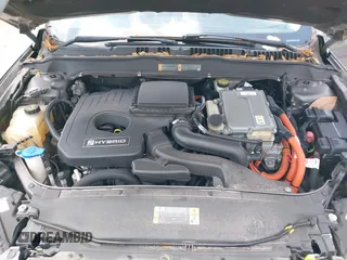 2013 Ford Fusion SE Hybrid with VIN 3FA6P0LU3DR338282, listed as a IAAI auction lot 41973498 with 187,375 mi miles. Bid and sale history available at carsss.com. Image 10.