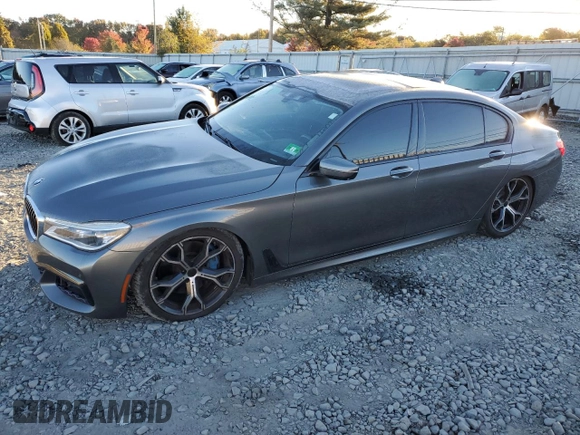 2017 BMW 7 Series with VIN WBA7F2C32HG422866, listed as a Copart auction lot 76177184 with 146,565 mi miles and Salvage Title. Bid and sale history available at DreamBid. Image 1.