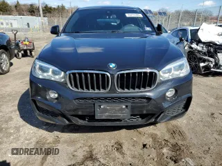 2019 BMW X6 xDrive35i with VIN 5UXKU2C5XK0Z63652, listed as a Copart auction lot 45275385 with 137,085 mi miles and Clean Title. Bid and sale history available at carsss.com. Image 5.
