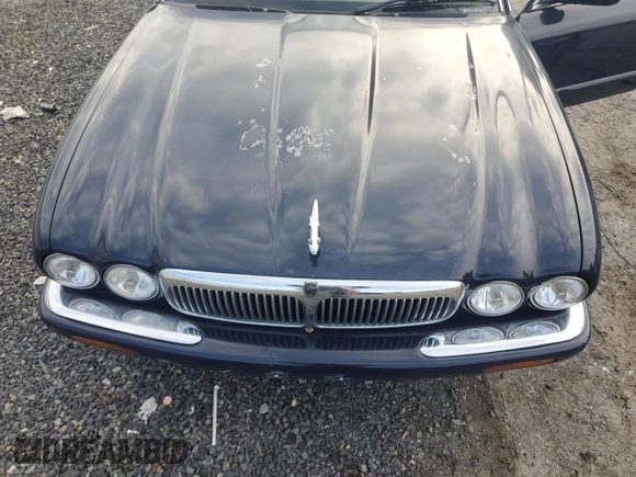2001 Jaguar XJ with VIN SAJDA14C41LF38763, listed as a Copart auction lot 86796434 with 60,076 mi miles and Clean Title. Bid and sale history available at carsss.com. Image 11.