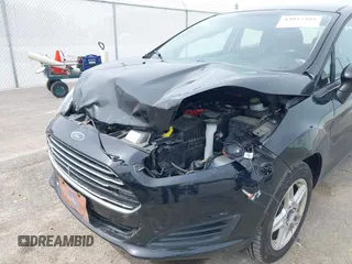 2018 Ford Fiesta SE with VIN 3FADP4EJ3JM132132, listed as a IAAI auction lot 42057403 with 75,944 mi miles and . Bid and sale history available at DreamBid. Image 6.