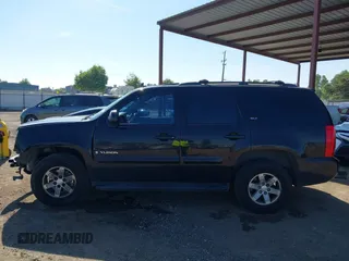 2008 GMC Yukon SLT w/4SB with VIN 1GKFC13J38R172711, listed as a IAAI auction lot 42067841 with 141,763 mi miles. Bid and sale history available at carsss.com. Image 15.