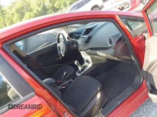 2019 Ford Fiesta SE z VIN 3FADP4BJXKM122235, wystawiony jako IAAI lot #42457164 z przebiegiem 103 265 mil mil oraz . Historia ofert i sprzedaży dostępna na DreamBid. Obrazek 5.