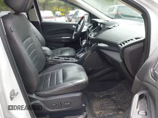 2016 Ford Escape Titanium with VIN 1FMCU9J98GUA00832, listed as a IAAI auction lot 42188941 with 90,764 mi miles and . Bid and sale history available at DreamBid. Image 5.