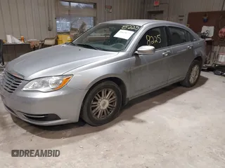 2013 Chrysler 200 LX with VIN 1C3CCBAG0DN737577, listed as a IAAI auction lot 41678225 with 165,186 mi miles. Bid and sale history available at carsss.com. Image 2.