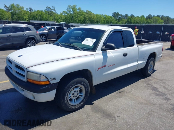 1999 Dodge Dakota SLT z VIN 1B7GL22X0XS193423, wystawiony jako IAAI lot #42053562 z przebiegiem 209 802 mil mil oraz . Historia ofert i sprzedaży dostępna na DreamBid. Obrazek 17.