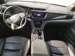 2020 Cadillac XT6 FWD Premium Luxury with VIN 1GYKPCRS6LZ102682, listed as a Copart auction lot 56906645 with 76,884 mi miles and Salvage title. Bid and sale history available at DreamBid. Image 8.