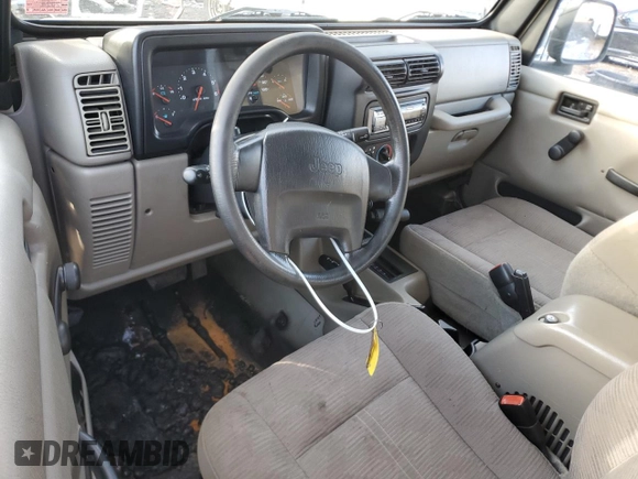2004 Jeep Wrangler Sport z VIN 1J4FA49SX4P723705, wystawiony jako Copart lot #46944215 z przebiegiem 157 731 mil mil oraz Czysty tytuł • Clean title. Historia ofert i sprzedaży dostępna na DreamBid. Obrazek 8.