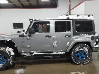 2013 Jeep Wrangler Unlimited Sport z VIN 1C4BJWDG3DL628784, wystawiony jako IAAI lot #41311183 z przebiegiem 125 118 mil mil oraz . Historia ofert i sprzedaży dostępna na DreamBid. Obrazek 14.