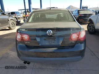 2010 Volkswagen Jetta S with VIN 3VWJZ7AJ7AM051940, listed as a Copart auction lot 54792105 with 159,460 mi miles and Salvage title. Bid and sale history available at DreamBid. Image 6.
