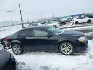 2013 Dodge Avenger SE with VIN 1C3CDZAB3DN564342, listed as a IAAI auction lot 41192817 with 159,216 mi miles and . Bid and sale history available at DreamBid. Image 14.